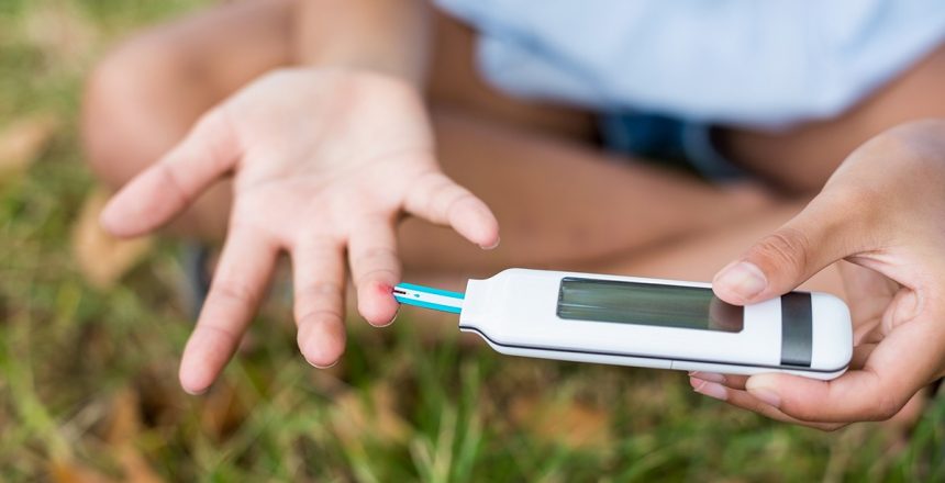 girl-testing-diabetes-on-glucose-meter-2021-08-28-18-10-05-utc
